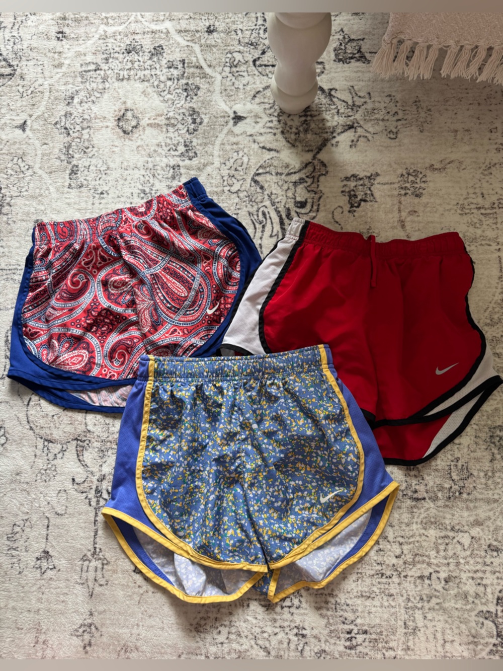 Nike Red Running Shorts with Blue and Patterned Floral Pairs